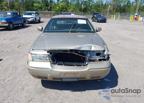 1999 Mercury Grand Marquis Gs из США, поврежденный, VIN 2MEFM74W4XX608720